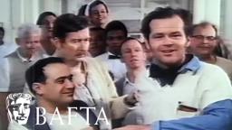 Jack Nicholson accepts his award on the set of One Flew Over the Cuckoo's Nest