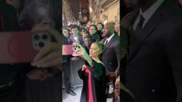 Ariana Grande showing all the love to fans at the Paris screening