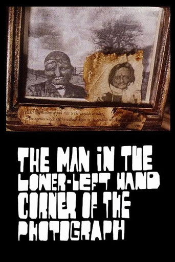 The Man in the Lower-Left Hand Corner of The Photograph Poster